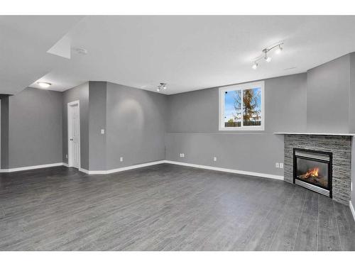 89 Kilburn Crescent, Red Deer, AB - Indoor With Fireplace