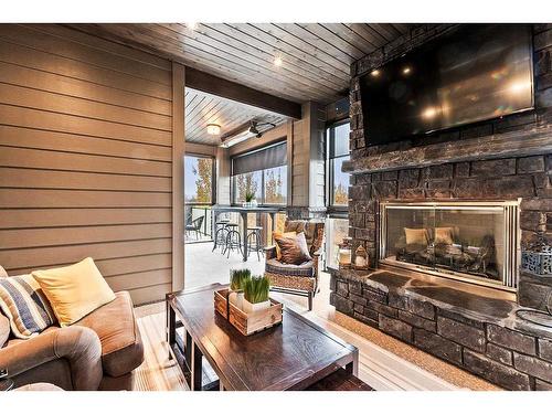 20 Sagewood Close, Red Deer, AB - Indoor Photo Showing Living Room With Fireplace