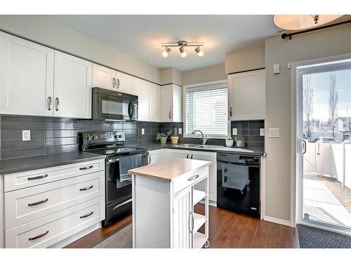 2203-30 Carleton Avenue West, Red Deer, AB - Indoor Photo Showing Kitchen With Double Sink