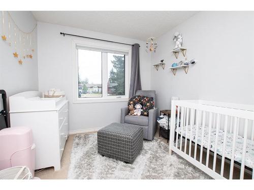 13 Crawford Street, Red Deer, AB - Indoor Photo Showing Bedroom