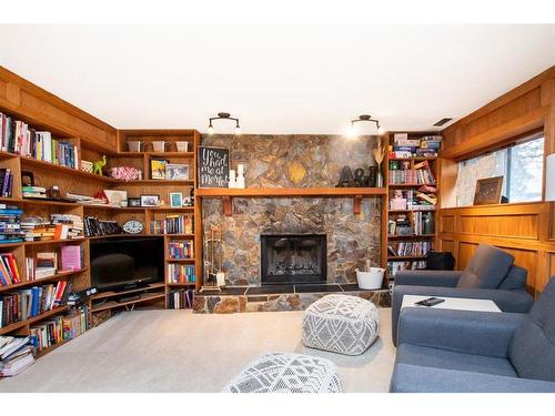 13 Crawford Street, Red Deer, AB - Indoor Photo Showing Living Room With Fireplace