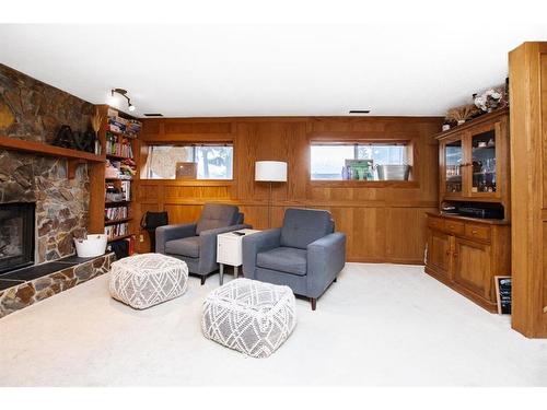 13 Crawford Street, Red Deer, AB - Indoor Photo Showing Living Room With Fireplace