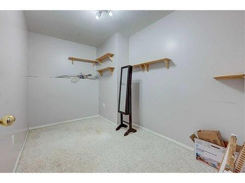 49 Old Boomer Road, Sylvan Lake, AB - Indoor Photo Showing Other Room