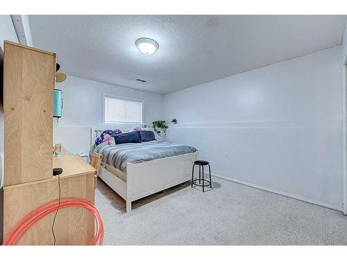 49 Old Boomer Road, Sylvan Lake, AB - Indoor Photo Showing Bedroom