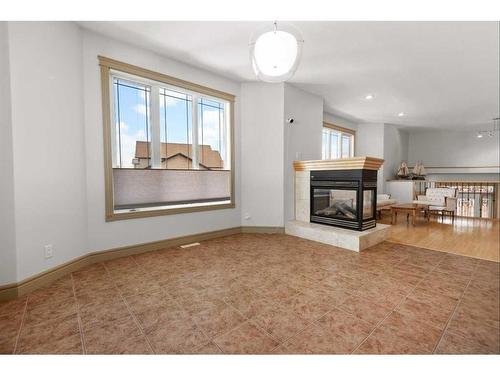 262 Addington Drive, Red Deer, AB - Indoor Photo Showing Living Room With Fireplace