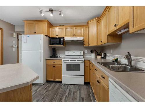 4012 69A Street Close, Camrose, AB - Indoor Photo Showing Kitchen With Double Sink