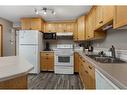 4012 69A Street Close, Camrose, AB  - Indoor Photo Showing Kitchen With Double Sink 