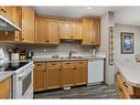 4012 69A Street Close, Camrose, AB  - Indoor Photo Showing Kitchen With Double Sink 