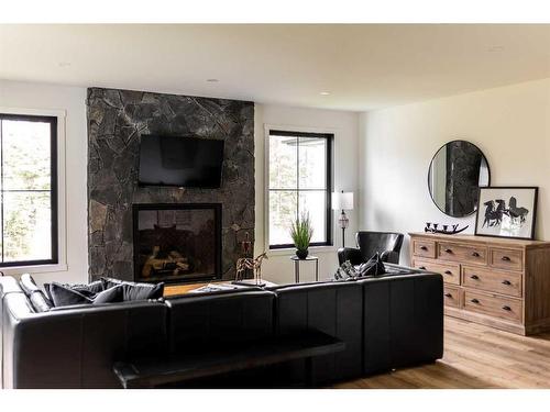 132 Meadow Ponds Drive, Rural Clearwater County, AB - Indoor Photo Showing Living Room With Fireplace