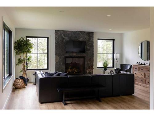 132 Meadow Ponds Drive, Rural Clearwater County, AB - Indoor Photo Showing Other Room With Fireplace