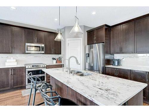 18 Caribou Crescent, Red Deer, AB - Indoor Photo Showing Kitchen With Stainless Steel Kitchen With Double Sink With Upgraded Kitchen