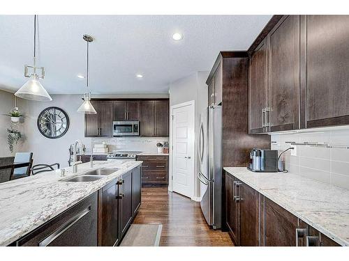 18 Caribou Crescent, Red Deer, AB - Indoor Photo Showing Kitchen With Stainless Steel Kitchen With Double Sink With Upgraded Kitchen