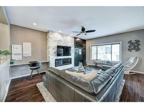 18 Caribou Crescent, Red Deer, AB - Indoor Photo Showing Living Room With Fireplace