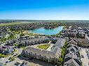 1210-11 Mahogany Row Se, Calgary, AB  - Outdoor With Body Of Water With View 