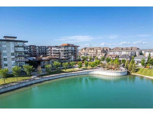 1210-11 Mahogany Row Se, Calgary, AB - Outdoor With Body Of Water With View