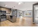 1210-11 Mahogany Row Se, Calgary, AB  - Indoor Photo Showing Kitchen With Stainless Steel Kitchen 