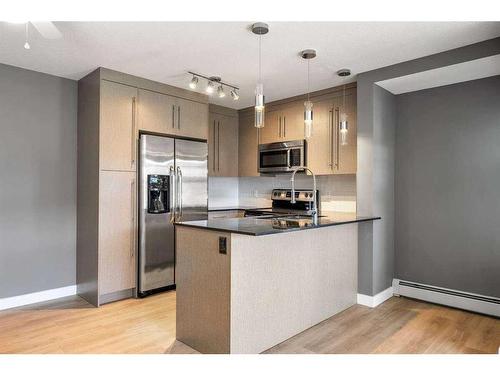 1210-11 Mahogany Row Se, Calgary, AB - Indoor Photo Showing Kitchen With Stainless Steel Kitchen