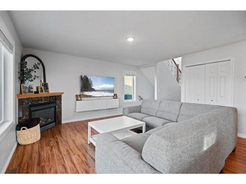 7514 40 Avenue, Camrose, AB - Indoor Photo Showing Living Room With Fireplace