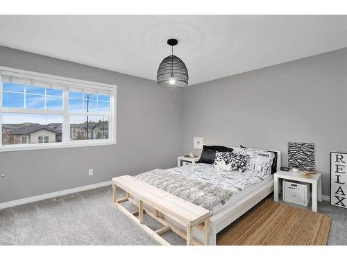 123 Hinshaw Drive, Sylvan Lake, AB - Indoor Photo Showing Bedroom