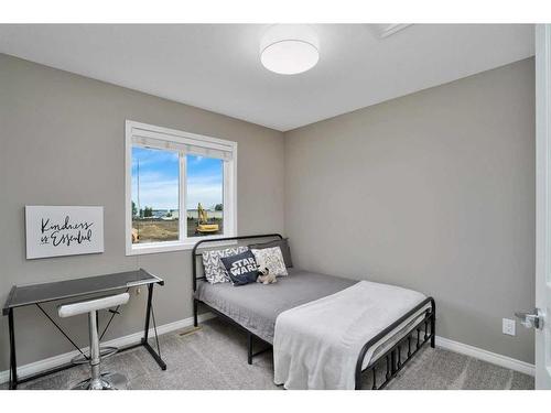 123 Hinshaw Drive, Sylvan Lake, AB - Indoor Photo Showing Bedroom