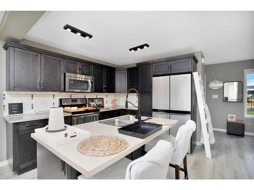 123 Hinshaw Drive, Sylvan Lake, AB - Indoor Photo Showing Kitchen With Double Sink