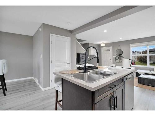 123 Hinshaw Drive, Sylvan Lake, AB - Indoor Photo Showing Kitchen With Double Sink