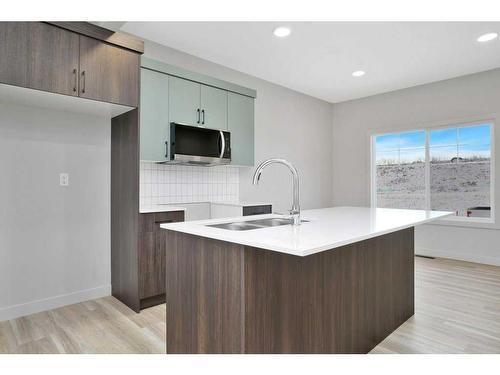 120 Gray Close, Sylvan Lake, AB - Indoor Photo Showing Kitchen With Double Sink