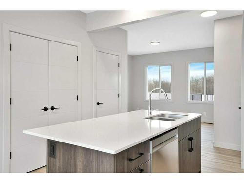 120 Gray Close, Sylvan Lake, AB - Indoor Photo Showing Kitchen With Double Sink