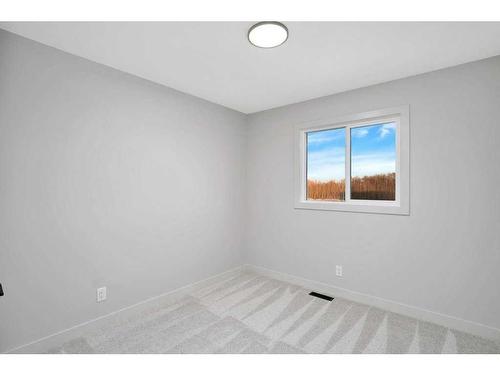 122 Gray Close, Sylvan Lake, AB - Indoor Photo Showing Other Room