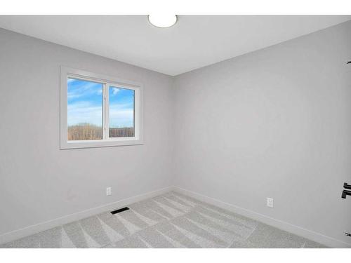 122 Gray Close, Sylvan Lake, AB - Indoor Photo Showing Other Room