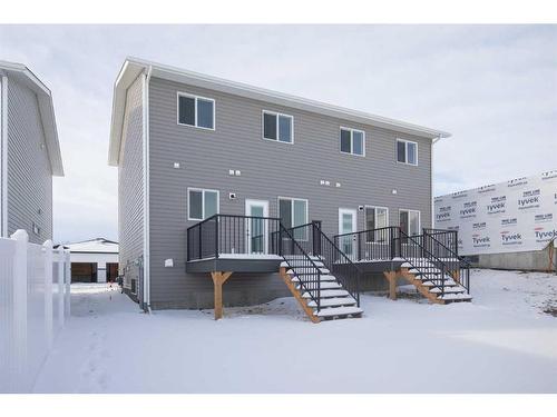 122 Gray Close, Sylvan Lake, AB - Outdoor With Facade