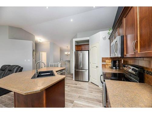 70 Rozier Close, Sylvan Lake, AB - Indoor Photo Showing Kitchen With Double Sink