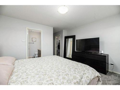 70 Rozier Close, Sylvan Lake, AB - Indoor Photo Showing Bedroom