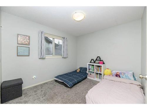 70 Rozier Close, Sylvan Lake, AB - Indoor Photo Showing Bedroom