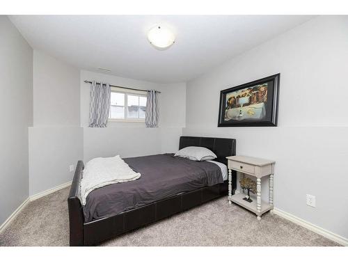 70 Rozier Close, Sylvan Lake, AB - Indoor Photo Showing Bedroom