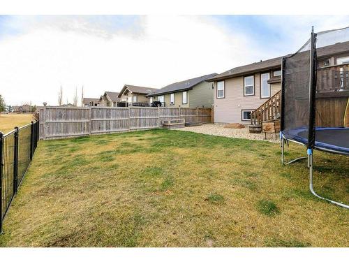 70 Rozier Close, Sylvan Lake, AB - Outdoor With Backyard