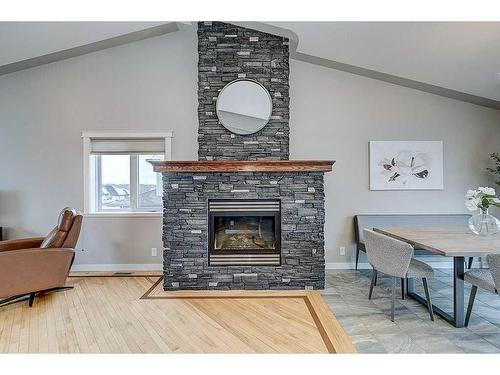 34 Fieldstone Way, Sylvan Lake, AB - Indoor Photo Showing Living Room With Fireplace