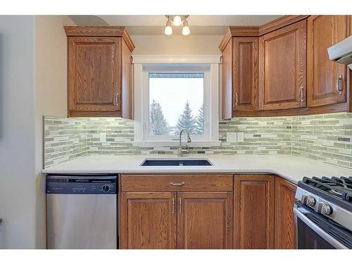 34 Fieldstone Way, Sylvan Lake, AB - Indoor Photo Showing Kitchen With Double Sink