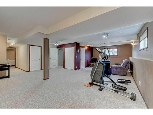 34 Fieldstone Way, Sylvan Lake, AB - Indoor Photo Showing Gym Room