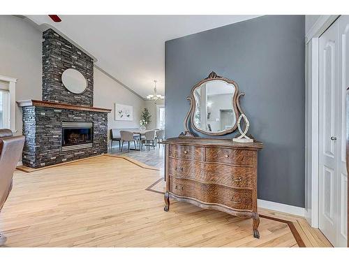 34 Fieldstone Way, Sylvan Lake, AB - Indoor Photo Showing Other Room With Fireplace