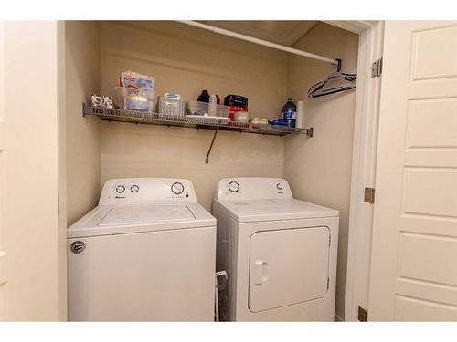 4086 Ryders Ridge Boulevard, Sylvan Lake, AB - Indoor Photo Showing Laundry Room