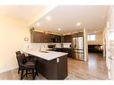 4086 Ryders Ridge Boulevard, Sylvan Lake, AB  - Indoor Photo Showing Kitchen With Double Sink 