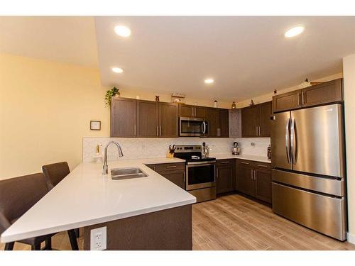 4086 Ryders Ridge Boulevard, Sylvan Lake, AB - Indoor Photo Showing Kitchen With Double Sink