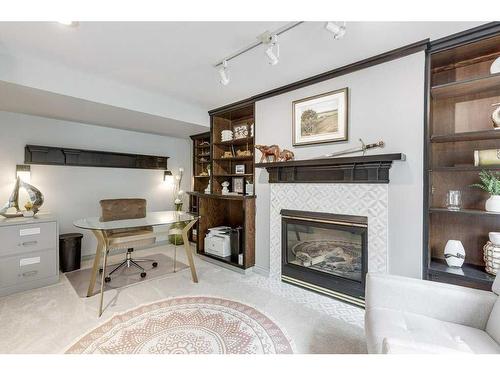 3526 Spruce Drive, Red Deer, AB - Indoor Photo Showing Living Room With Fireplace