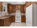 117 Bateson Street, Bittern Lake, AB  - Indoor Photo Showing Kitchen With Double Sink 