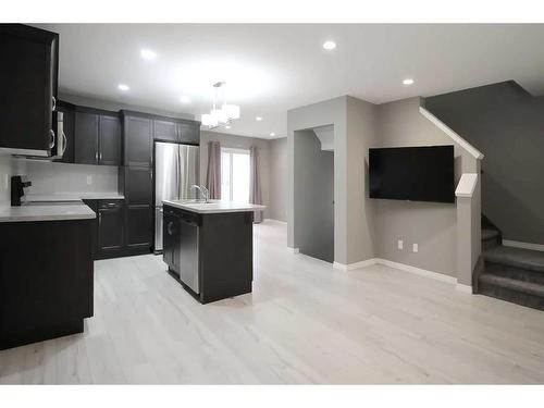 15 Hampton Crescent, Sylvan Lake, AB - Indoor Photo Showing Kitchen With Stainless Steel Kitchen