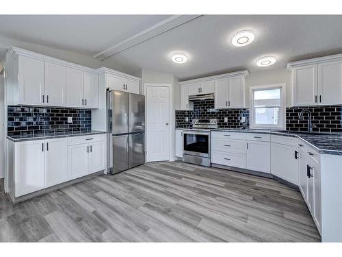 1912 20 Street, Delburne, AB - Indoor Photo Showing Kitchen With Double Sink