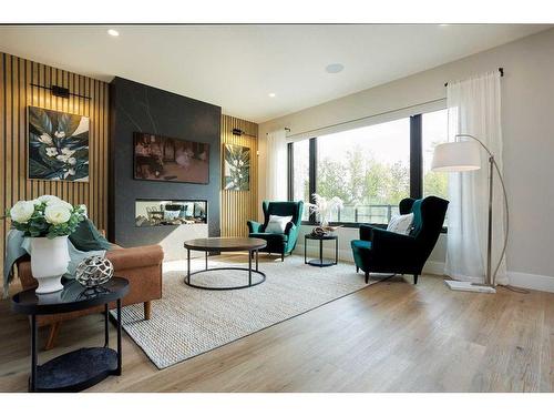 125 Emerald Drive, Red Deer, AB - Indoor Photo Showing Living Room With Fireplace