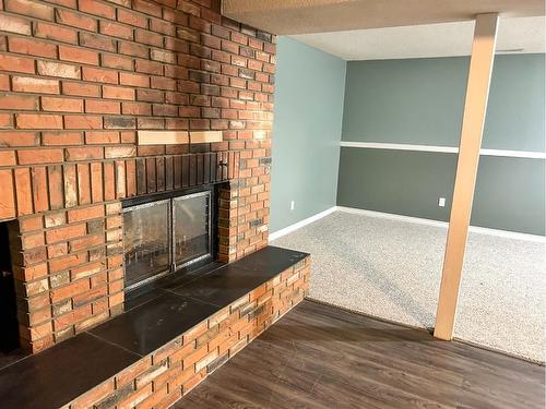 5411 51 Avenue, Rocky Mountain House, AB - Indoor With Fireplace