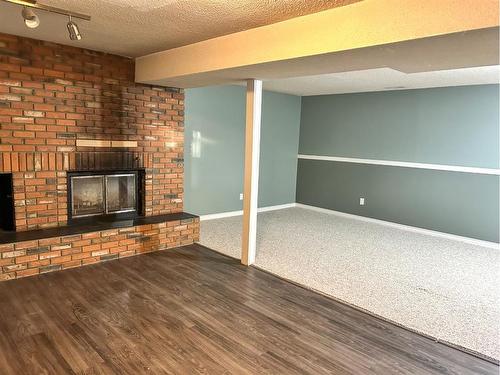 5411 51 Avenue, Rocky Mountain House, AB - Indoor With Fireplace